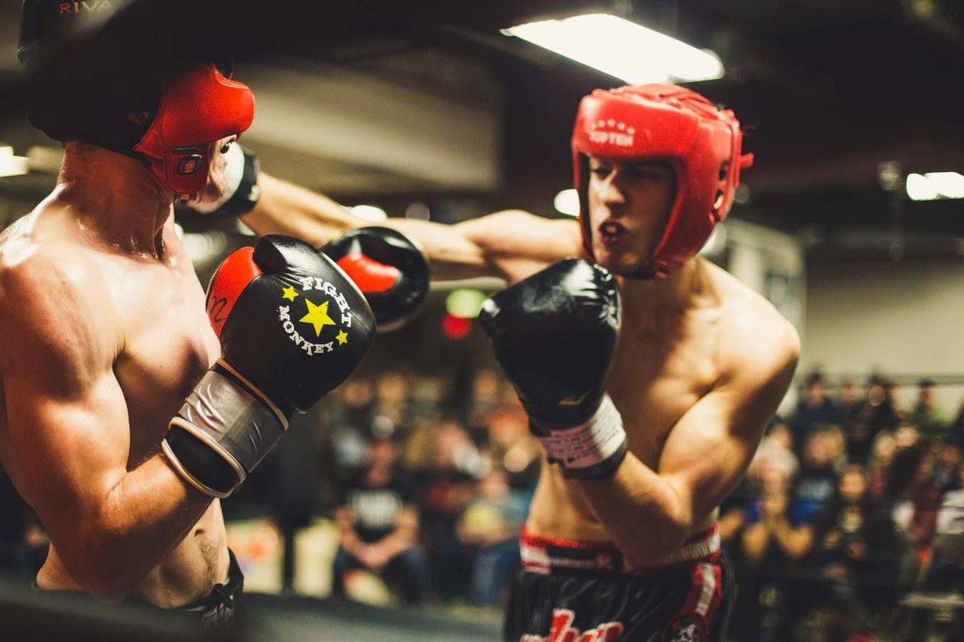 Two boxers punching the lights out of each other.