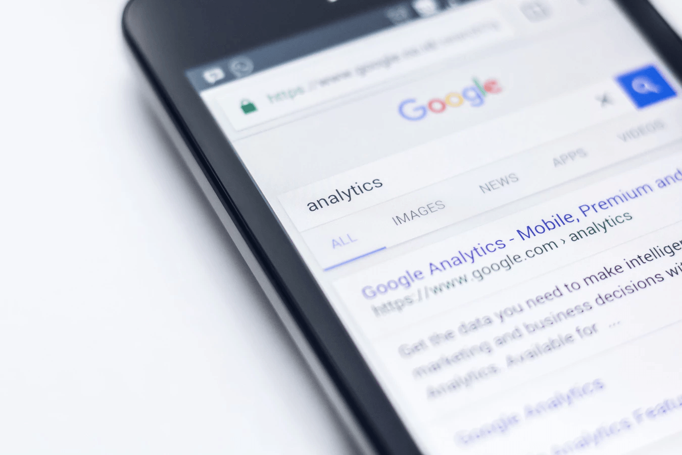 A phone that shows a Google search for the keyword 