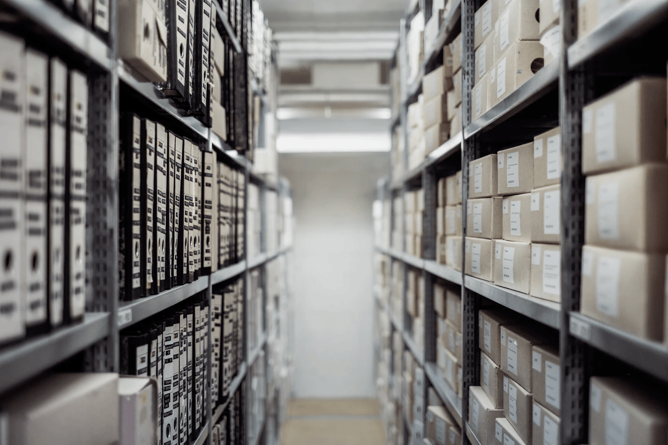 Shelves of stacked documents.